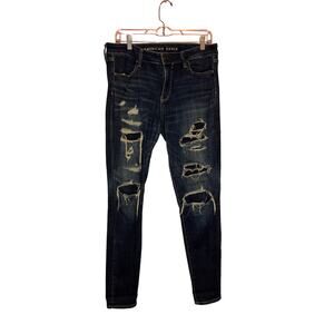 American Eagle extremely distressed mid rise jegging size 10 regular